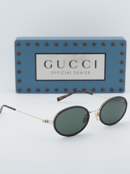Gucci GG1980S 001 Oval Sunglasses - Transparent Dark Grey/Gold